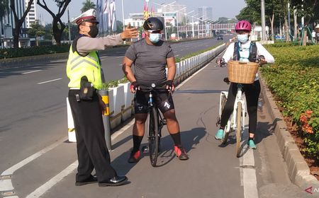 Dicegat Polisi, Pesepeda di Sudirman: Bersepeda Kan Bagus Kena Matahari