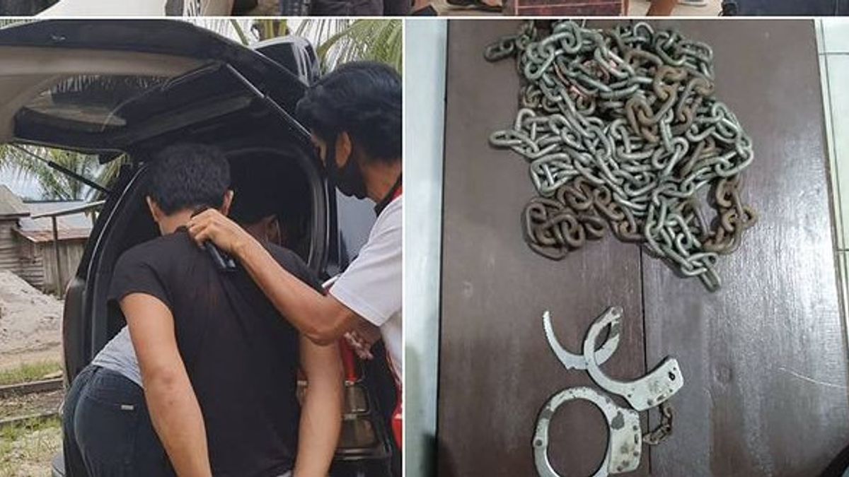 男子在Kotim，加里曼丹中部，Pukuli和Sekap女人戴着手铐，他们的孩子被橡胶轮胎绑住