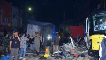 in Jalan, PkL Pasar Ilir Palembang Rapided par un officier conjoint