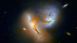 Teleskop Hubble Tangkap Dua Galaksi Tengah Berinteraksi, Sebabkan Tabrakan Besar dan Pembentukan Bintang Baru