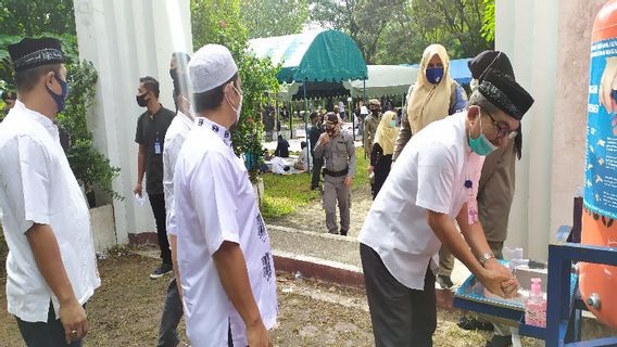 Peringatan 16 Tahun Tsunami Aceh di Kuburan Massal: Doa Bersama dengan Protokol Kesehatan