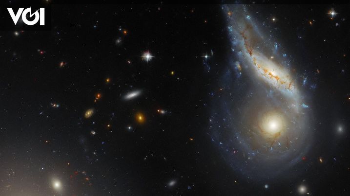 Breathtaking Photos from Hubble Space Telescope: Two Galaxies Collide and become One