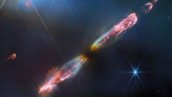 Serupa Lightsaber, NASA Bagikan Potret Herbig-Haro 211 yang Keluar dari Bintang Kecil