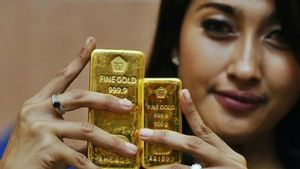 Harga Emas Antam Turun <i>Goceng</i> ke Rp1.414.000 per Gram