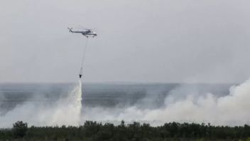 OKI Sumsel的森林和陆地火灾应急响应,部署了4架水爆直升机
