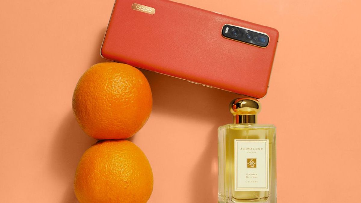 オッポとジョー マローンの美しいコラボレーションは オレンジ色のテクスチャースマートフォンを提示し