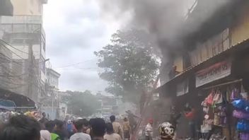 アセムカ市場のマスク倉庫が燃えている