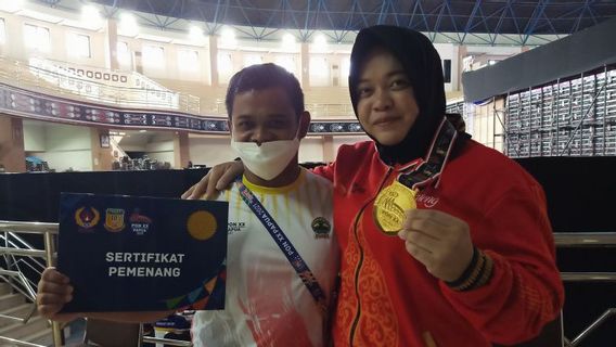 Conquering The 120 Kg Barbell, Lifter Diah Ayu Breaks The National Record At PON Papua