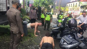 Banyak Bule di Bali Bandel Tak Pakai Masker Sepelekan COVID-19, Hukumannya <i>Push up</i>