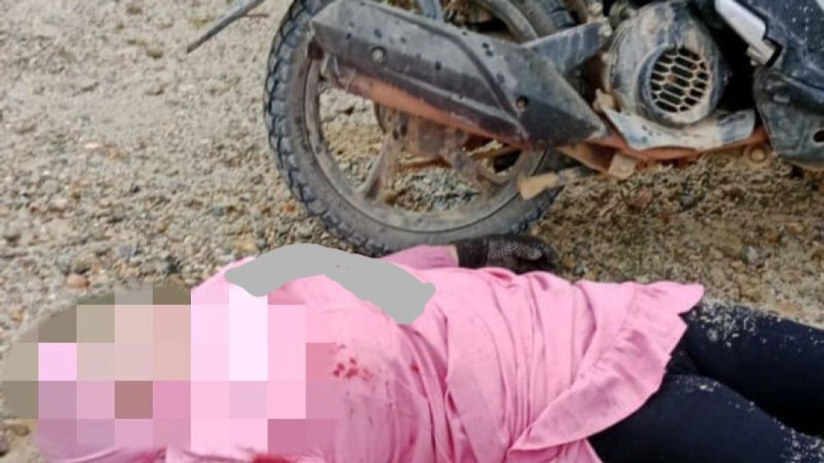 在西加里曼丹的Pinang Laka Street被撕裂的粉红色服装女子被谋杀的动机是由心痛引发的