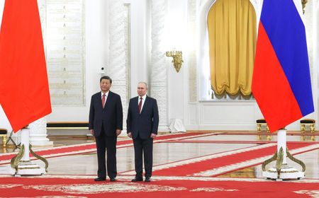 Terima Presiden Xi Jinping di Kremlin, Vladimir Putin Sebut Kerja Sama Rusia-China Berkembang dan Menguat Demi Rakyat