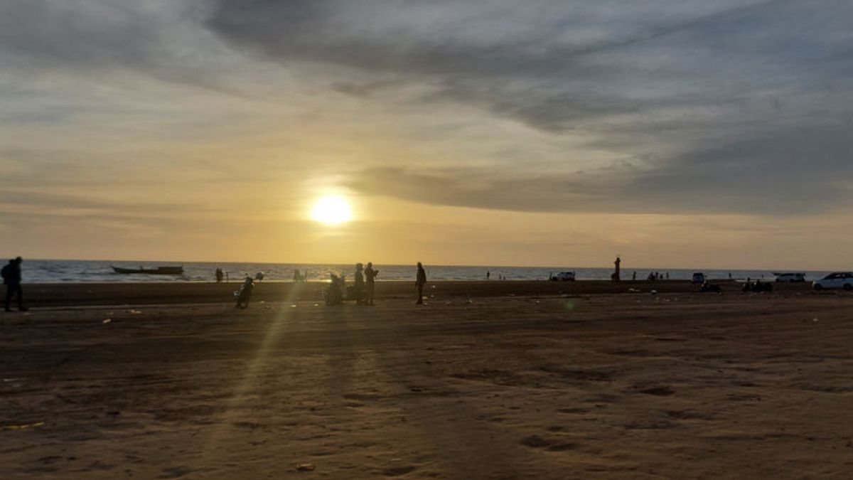 Welcoming The Excitement Of PON XX While Enjoying The Beautiful Sunset At Imbuti Beach, Merauke