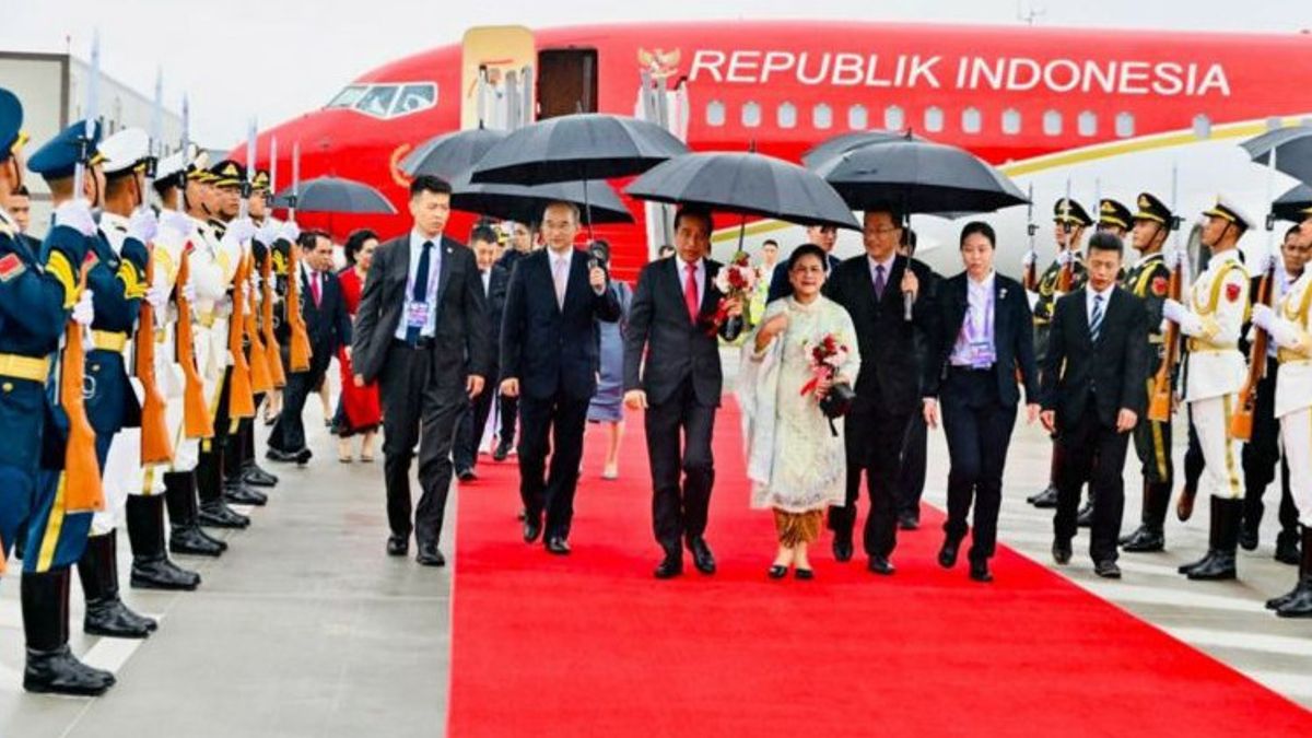 President Jokowi And First Lady Iriana Arrive In China