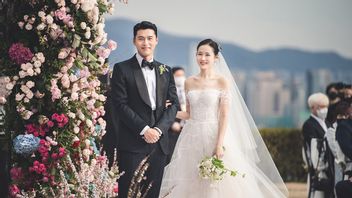 جميلة مليئة بالزهور ، صور رسمية لحفل زفاف هيون بن وابنه يي جين الذي أصدرته الوكالة أخيرا