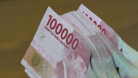 Rupiah Dibuka Melemah Tipis 9 Poin ke Level Rp14.699 per Dolar AS