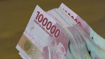 Rupiah Dibuka Melemah Tipis 9 Poin ke Level Rp14.699 per Dolar AS