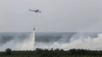12 南苏门答腊森林和陆地火灾水轰炸直升机,Ogan Komering Ilir的处理重点