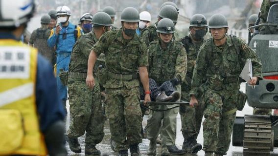 Rescue Team For The Evacuation Of Flood And Landslide Victims That Killed 35 People In Japan