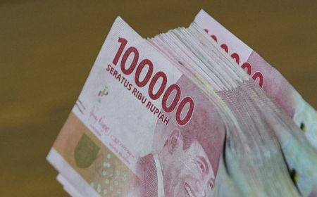 Rupiah Dibuka Melemah Tipis 9 Poin ke Level Rp14.699 per Dolar AS