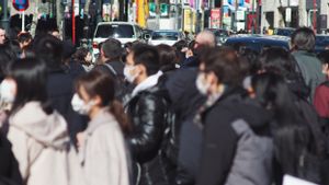Jepang Berencana Turunkan Status COVID-19 Seperti Flu Musiman Mulai Musim Semi