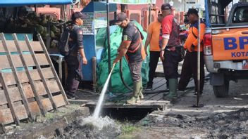 极端降雨引起的洪水有可能淹没帕朗卡拉亚,BPBD清理排水系统