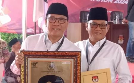 Jelang Pencoblosan, KPU Kota Metro Batalkan Paslon Nomor Urut 2 Wahdi-Qomaru Zaman