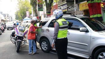 ジョグジャのモール駐車場の役員は、訪問者、警察の狩猟加害者によって痴漢されたとされる