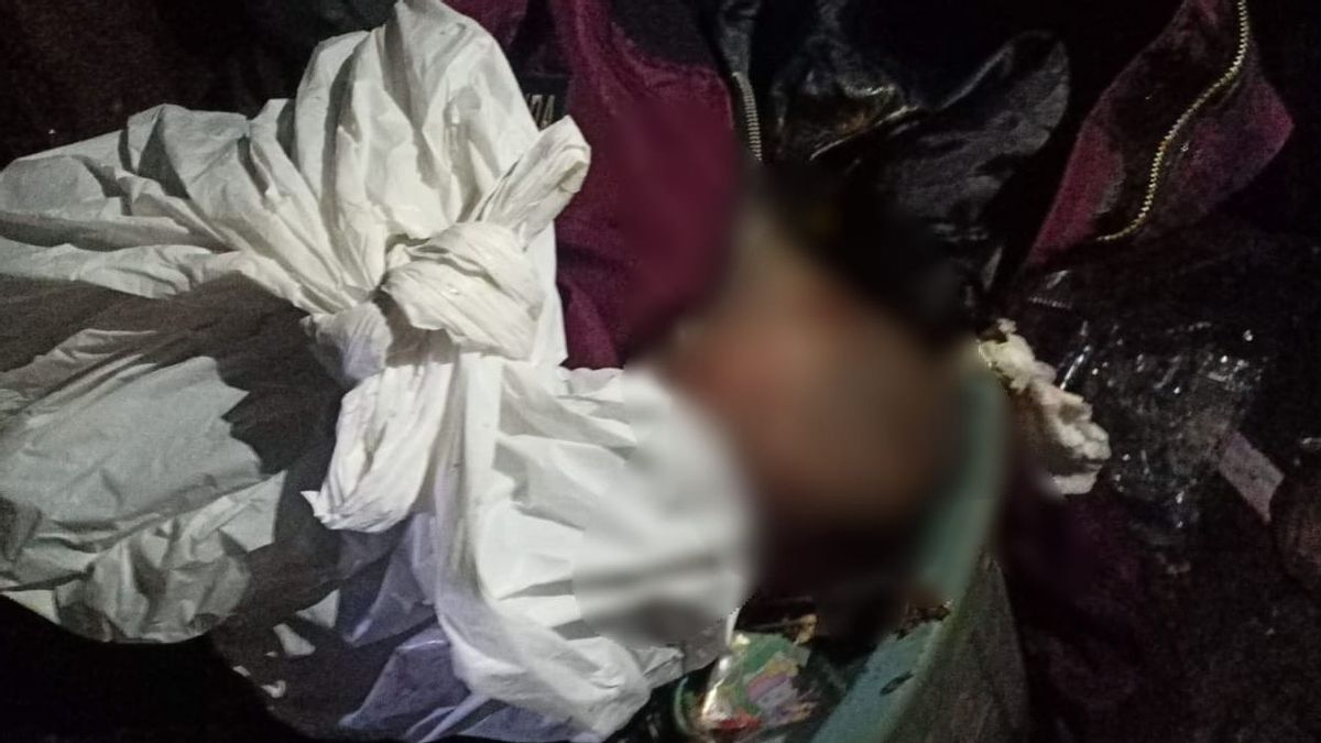 女の子の赤ちゃんの遺体は、ゴミ箱の赤いジャケットで覆われた死体を発見