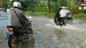 Flood Surut, Palembang Residents Start Normal Activities