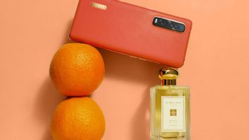 奥波和乔 · 马龙之间的美丽合作呈现橙色纹理智能手机