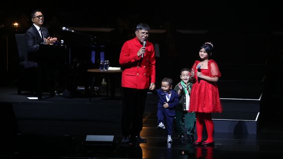 Portrait Of Harvey Malaiholo's Family Harmoni At The 50 Years Of Work Concert